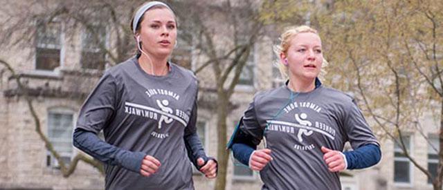 Participants running a 5K on the Carroll University campus